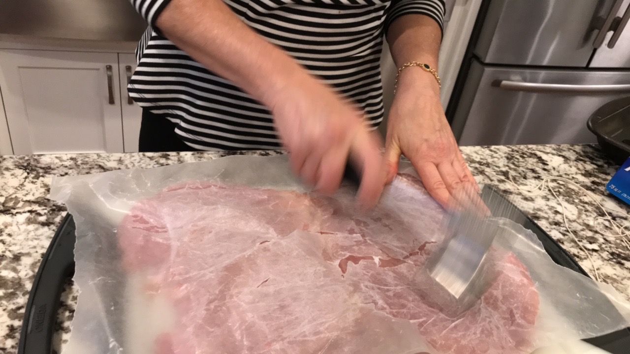 Preparing the turkey breast - Step 3 flattening with a meat mallet